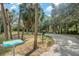 Nature trail with palm trees and a trail map at 3700 Dana Shores Dr, Tampa, FL 33634