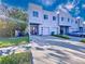 Contemporary townhome community with driveway parking at 510 N Hubert Ave # 1B, Tampa, FL 33609