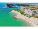 Stunning aerial view of the beachfront property at 7000 Beach Plz # 706, St Pete Beach, FL 33706