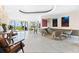 Inviting lobby area with comfortable seating, stylish decor, and waterfront views at 7000 Beach Plz # 706, St Pete Beach, FL 33706