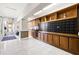 Well-lit lobby hallway with organized mailboxes and convenient package storage area at 7000 Beach Plz # 706, St Pete Beach, FL 33706