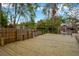Wooden dock over the water with a view of the canal and surrounding trees at 703 W Sligh Ave, Tampa, FL 33604