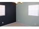 Bedroom with two-toned painted walls and a ceiling fan with a light fixture at 7116 Kingsbury Cir, Tampa, FL 33610
