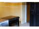 Kitchen features black appliances, including a flat-top range, and light countertops at 7116 Kingsbury Cir, Tampa, FL 33610