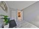 Simple bedroom with gray walls and wood-look flooring at 7471 35Th N St, Pinellas Park, FL 33781