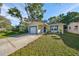 Charming single story home with a newly painted exterior and updated garage door at 7471 35Th N St, Pinellas Park, FL 33781