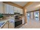 Updated kitchen with stainless steel appliances and wood countertops at 7471 35Th N St, Pinellas Park, FL 33781