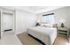 King bed, window, and closet in a bright bedroom at 819 59Th Ave, St Pete Beach, FL 33706