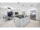 Modern kitchen with a large island and breakfast bar at 819 59Th Ave, St Pete Beach, FL 33706