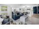 Open concept living space with comfortable seating and a sleek modern design at 819 59Th Ave, St Pete Beach, FL 33706