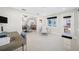 Spacious home office with built-in desk and access to the kitchen at 819 59Th Ave, St Pete Beach, FL 33706