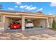 Attached garage with a red sports car and a white SUV at 1160 Darlington Oak Ne Dr, St Petersburg, FL 33703