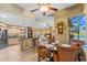 Eat-in kitchen with stainless steel appliances and breakfast bar at 1160 Darlington Oak Ne Dr, St Petersburg, FL 33703
