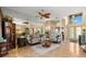 Spacious living room with a mirrored wall, comfortable seating, and stylish decor at 1160 Darlington Oak Ne Dr, St Petersburg, FL 33703