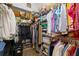 Well-organized walk-in closet with ample shelving and hanging space for clothes and accessories at 1160 Darlington Oak Ne Dr, St Petersburg, FL 33703
