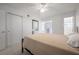 Relaxing bedroom with a double bed and en-suite bathroom at 2386 Sumatran Way # 34, Clearwater, FL 33763