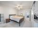 Cozy bedroom with a double bed and access to the bathroom at 2386 Sumatran Way # 34, Clearwater, FL 33763