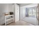 Bright kitchen features white cabinets and a convenient kitchen island at 2386 Sumatran Way # 34, Clearwater, FL 33763