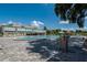 Community pool with plenty of lounge chairs and a fun noodle station at 2386 Sumatran Way # 34, Clearwater, FL 33763