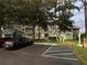 Condo building with parking lot and landscaping at 2533 Dolly Bay Dr # 101, Palm Harbor, FL 34684