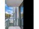 Private balcony with glass railings and city views at 3020 W Santiago St # 4, Tampa, FL 33629