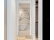 Luxurious bathroom with marble walls and a freestanding tub at 3020 W Santiago St # 4, Tampa, FL 33629