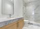 Modern bathroom with marble finishes and a large shower at 3020 W Santiago St # 4, Tampa, FL 33629