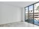 Modern bedroom with large windows and city views at 3020 W Santiago St # 4, Tampa, FL 33629