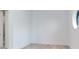 Simple bedroom with wood-look floors and a large window at 3020 W Santiago St # 4, Tampa, FL 33629