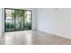 Bright bedroom with large window and hardwood floors at 3020 W Santiago St # 4, Tampa, FL 33629