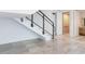 Bright entryway with modern staircase and elevator at 3020 W Santiago St # 4, Tampa, FL 33629