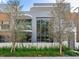Modern two-story home with gray and wood siding, and a landscaped front yard at 3020 W Santiago St # 4, Tampa, FL 33629