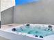 Modern hot tub with bubbling water and headrests at 3020 W Santiago St # 4, Tampa, FL 33629