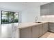 Modern kitchen with marble island and stainless steel sink at 3020 W Santiago St # 4, Tampa, FL 33629