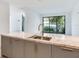 Modern kitchen with marble island and stainless steel sink at 3020 W Santiago St # 4, Tampa, FL 33629