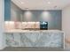 Modern kitchen with marble countertops and blue cabinets at 3020 W Santiago St # 4, Tampa, FL 33629