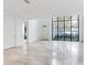 Open living area with large windows and marble floor at 3020 W Santiago St # 4, Tampa, FL 33629