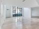 Spacious living area featuring large windows and hardwood floors at 3020 W Santiago St # 4, Tampa, FL 33629