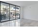 Bright living room with sliding doors to balcony at 3020 W Santiago St # 4, Tampa, FL 33629