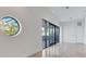 Modern living area with large windows and balcony access at 3020 W Santiago St # 4, Tampa, FL 33629