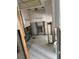 Bathroom under renovation showing tile floor and exposed framing at 409 Boca Ciega Point S Blvd # 1008, St Petersburg, FL 33708