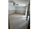 Empty bedroom with ceiling fan and exposed wall framing at 409 Boca Ciega Point S Blvd # 1008, St Petersburg, FL 33708