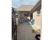 Cozy patio area with blue chairs and horse decor at 409 Boca Ciega Point S Blvd # 1008, St Petersburg, FL 33708