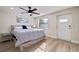 Spacious bedroom with a king-size bed and private access door at 490 82Nd Ave, St Pete Beach, FL 33706