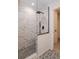 Spa-like shower with marble tile and a rainfall showerhead at 5120 55Th N St, Kenneth City, FL 33709