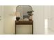 Welcoming entryway with a console table, mirror, and stylish decor at 7046 E 113Th Ct, Palmetto, FL 34221