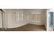 Spacious bedroom with vinyl flooring and large windows at 87 Rotonda Cir, Rotonda West, FL 33947