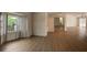 Bright and airy living room with hardwood floors at 87 Rotonda Cir, Rotonda West, FL 33947