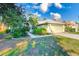 Charming one-story home featuring a two-car garage, mature landscaping, and inviting curb appeal at 10014 Cannon Dr, Riverview, FL 33578