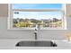 Kitchen sink with a view of a lake from the window at 11351 Callaway Pond Dr, Riverview, FL 33579